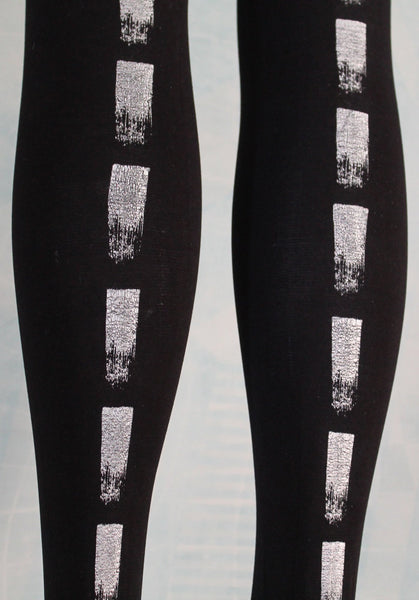 100 denier black tights, hand screen printed silver dash stripe, close up print detail