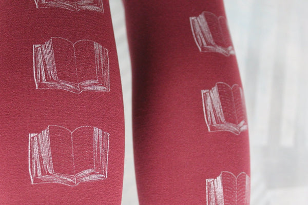 Metallic Silver hand screen printed books, 80 denier burgundy tights, close up print detail